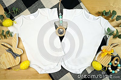 Easter farmhouse theme baby apparel top view flatlay. Mock up. Stock Photo