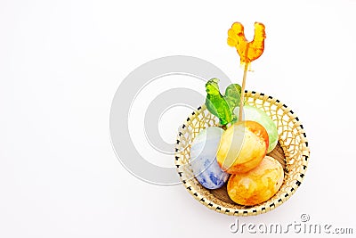 Easter fun painted eggs with chiken lollipops Stock Photo