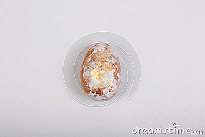 Easter gray golden egg on gray background. Easter concept. Minimalism. Top view, flatlay Stock Photo