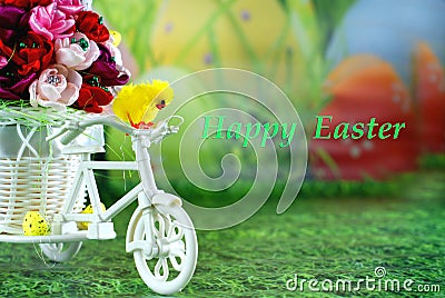 Easter greeting card with happy easter, chick on a bike with Easter eggs. Stock Photo