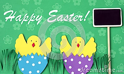 Easter hand made greeting card: hatched chicken in eggshell with blackboard isolated on flower background Stock Photo