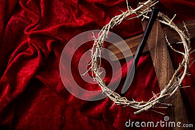 Easter holiday, reminder of the sacrifice of the Lord and Savior Jesus Christ concept with wooden cross, crown of thorns and rusty Stock Photo