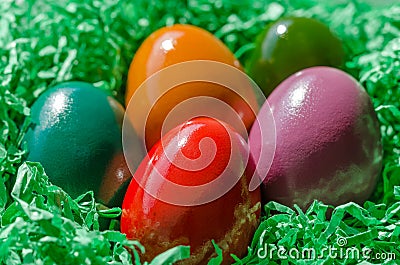 Easter nest with multicolored Paschal eggs, ready for an Easter egg hunt Stock Photo