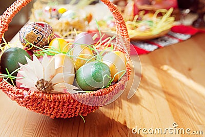 Easter painted eggs in traditional basket Stock Photo