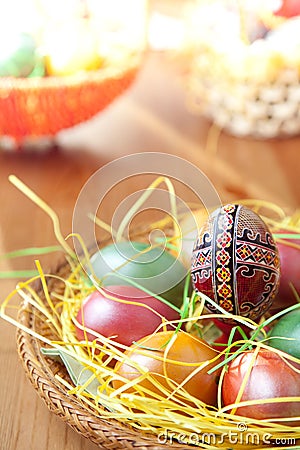 Easter painted eggs on traditional seasonal table Stock Photo