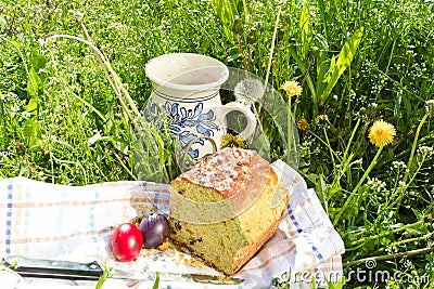 Easter panettone, eggs and jug with compote Stock Photo