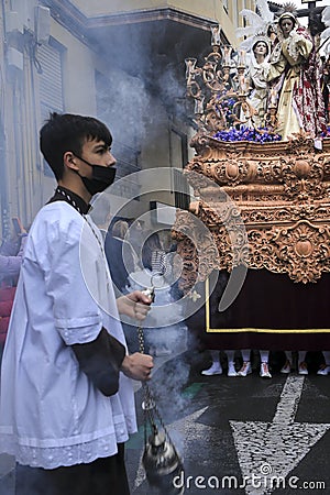 Easter Parade with altar boys in procession of Holy Week in Spain Editorial Stock Photo