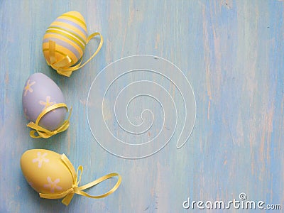 Easter picture colored egg on blue wooden background Stock Photo