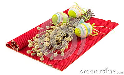 Easter willow with easter eggs on red mat Stock Photo