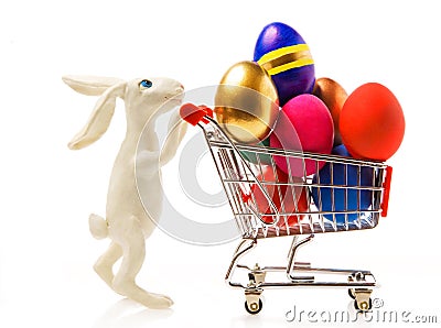 Easter rabbit with eggs in the cart Stock Photo