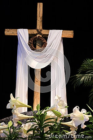 Easter Resurrection - Lilies, Cross and Crown of Thorns Stock Photo