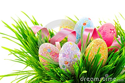 Easter scene. Colorful eggs in spring grass Stock Photo