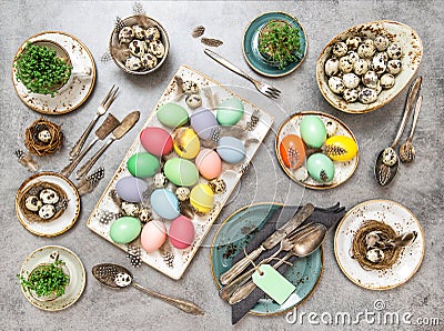 Easter table decorations colored eggs Flat lay Stock Photo