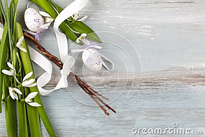 Easter whip with ribbon on wooden table. Stock Photo