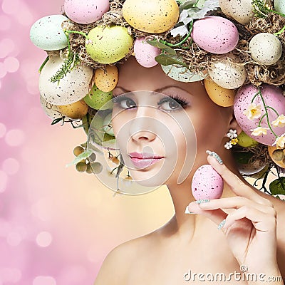 Easter Woman. Spring Girl with Fashion Hairstyle. Stock Photo