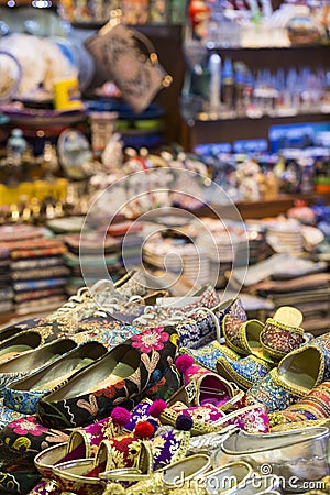 Eastern bazaar - handmade shoes. Image of selling point at Istanbul market with large selection of traditional arabic handmade or Stock Photo