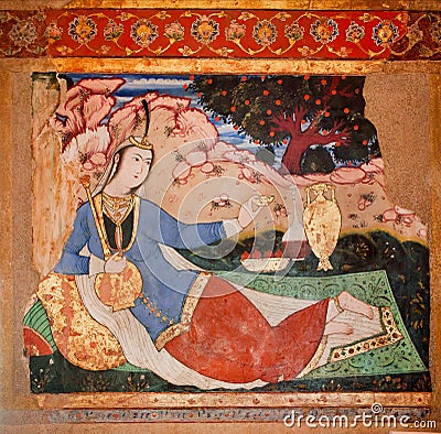 Eastern woman drinking tea in the garden of the fresco of palace in Iran. Editorial Stock Photo