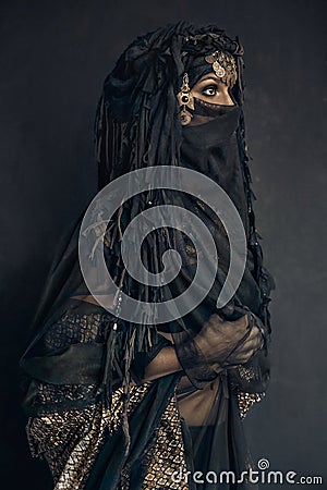 Eastern woman princess costume conceptual portrait Stock Photo