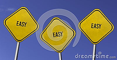 Easy - three yellow signs with blue sky background Stock Photo