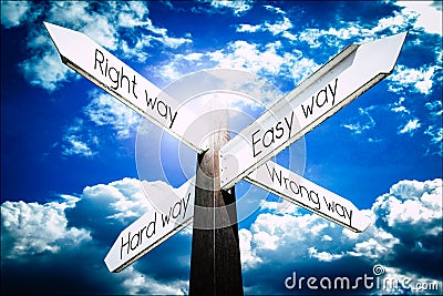 Easy way, hard way, right way, wrong way concept - signpost with four arrows Stock Photo