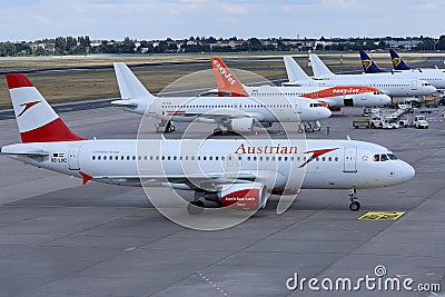 Easyjet, Austrian Airlines and Ryanair planes at terminal Editorial Stock Photo