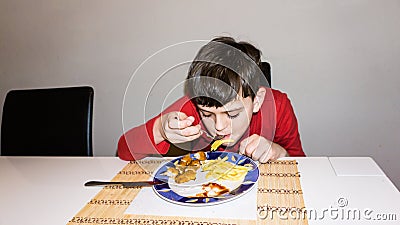 Eating autistic boy health nutrition child food son Stock Photo