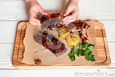 Eating grilled tasty ribs top view Stock Photo