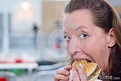 Eating hamburger Stock Photo