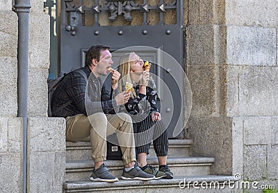 Eating ice-cream at the streets of Porto Editorial Stock Photo