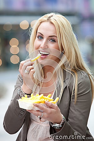 Eating junkfood Stock Photo