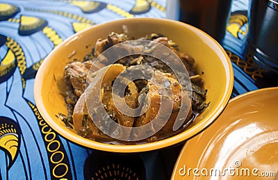 A small plate of Nigerian Vegetable Soup with assorted meat Stock Photo