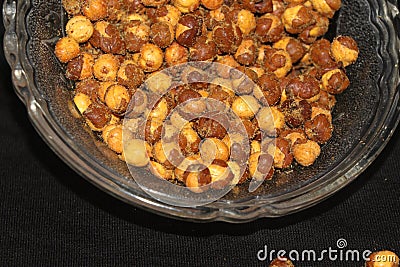 Eating roasted snack food indian salted Stock Photo