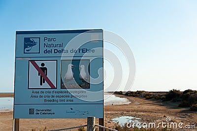 Ebro delta, Spain - 10 august 2019: national park sign advising of breeding birds protected area in ebro delta national park in Editorial Stock Photo