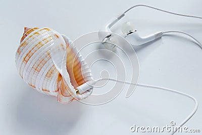 Eccentric way to listen music. Concepts - connection into the nature, different perspective to use the technology, imagination, Stock Photo
