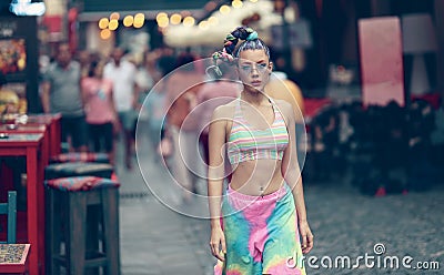 Eccentric woman model walking down the street - Female nonconformist - Unconventional girl Stock Photo