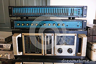 Echoizer tuner, compressor, dispensator, digital audio splitter, processor, speaker controller Old digital effects Stock Photo