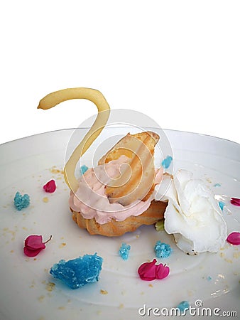 Eclair, in Swan shaped on white dish Stock Photo
