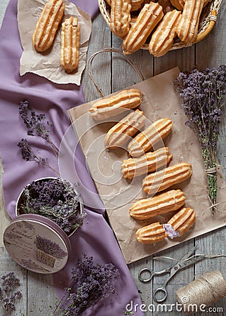 Eclairs or profiterole pastry dessert filled with whipped cream Stock Photo