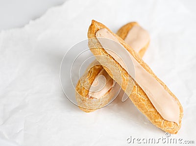 Eclairs on white backgroung Stock Photo