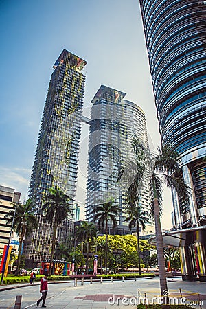 Eco architecture. Green skyscraper building with plants growing on the facade. Park in the sky. Kuala Lumpur. Malaysia Editorial Stock Photo