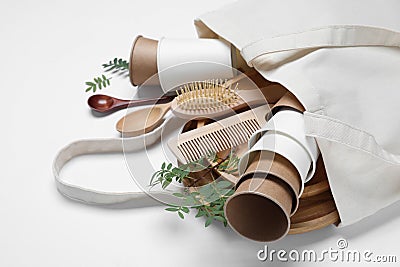 Eco bag with different disposable items on white background, closeup. Recycling concept Stock Photo
