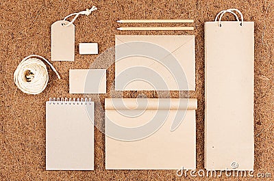 Eco blank packaging, stationery, gifts of kraft paper on brown coconut fiber background. Stock Photo
