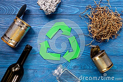 Eco concept with recycling symbol on blue table background top view Stock Photo