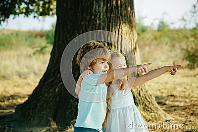 Eco farm for kids. Childhood memories. Eco resort child activities. Happy children farmers working with spud on spring Stock Photo