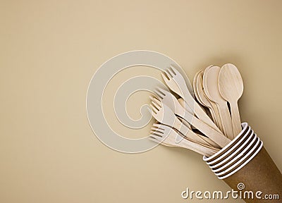 Eco-friendly disposable tableware made of paper on a pastel background Stock Photo