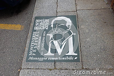 Eco friendly monteverdi festival sign in cremona, italy, placed on a sidewalk Editorial Stock Photo