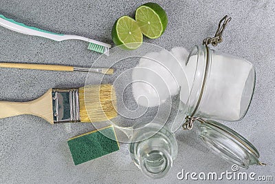 Eco-friendly natural cleaners, cleaning products. Homemade green cleaning on grey background. Stock Photo