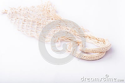 Eco friendly string bag on white background, responsible consumption. Ecological concept. Caring for the environment Stock Photo