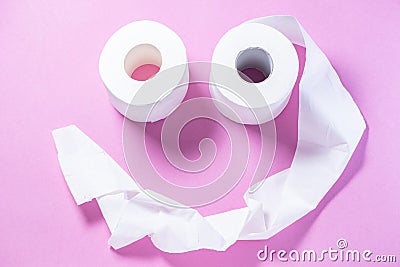 Eco-friendly white toilet paper on a pink background close-up Stock Photo