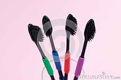 Eco toothbrushes made of bio degradable plastic and bamboo active charcoal Stock Photo